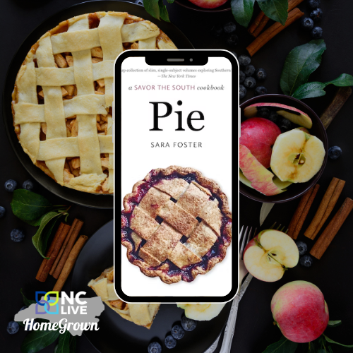 A phone with a pie cookbook on the screen.